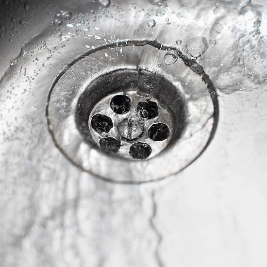 water draining in sink