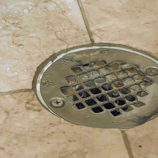 Gurgling shower drain