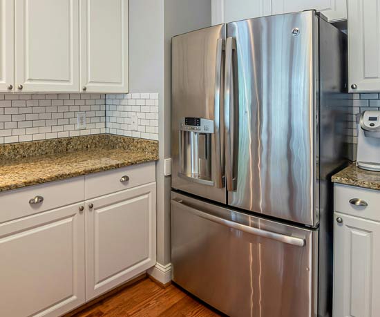 Refrigerator in a residential kitchen
