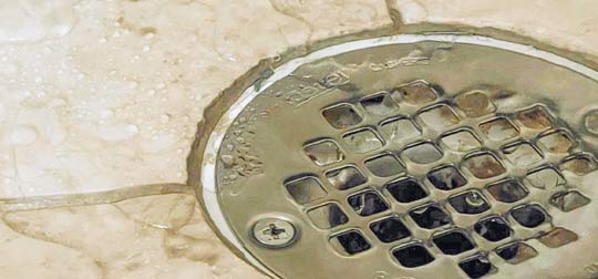 Gurgling shower drain