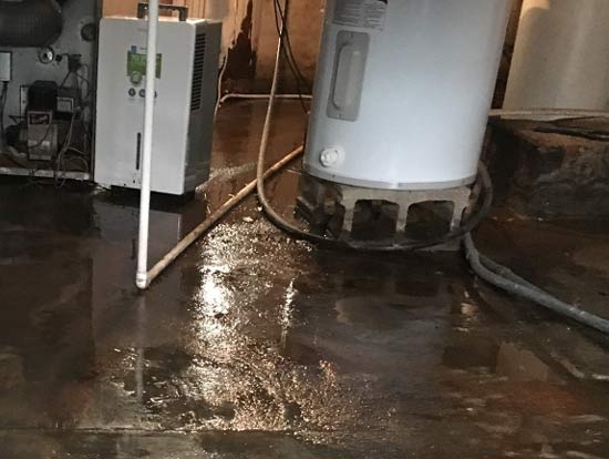 water on floor from leaking water heater
