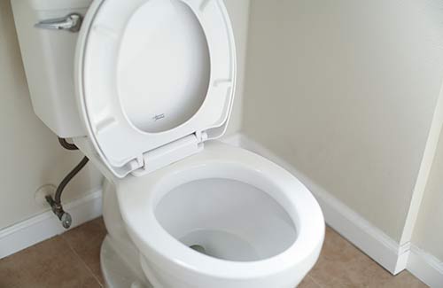 Repaired toilet in a bathroom