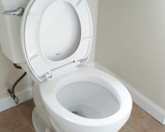 Repaired toilet in a residential bathroom